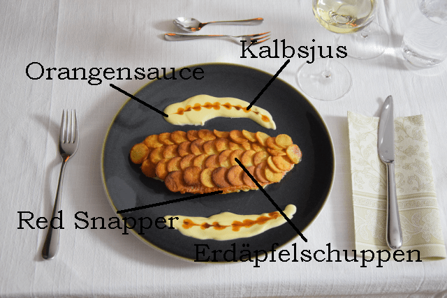 Red Snapper mit Erdäpfelschuppen (8) beschriftet